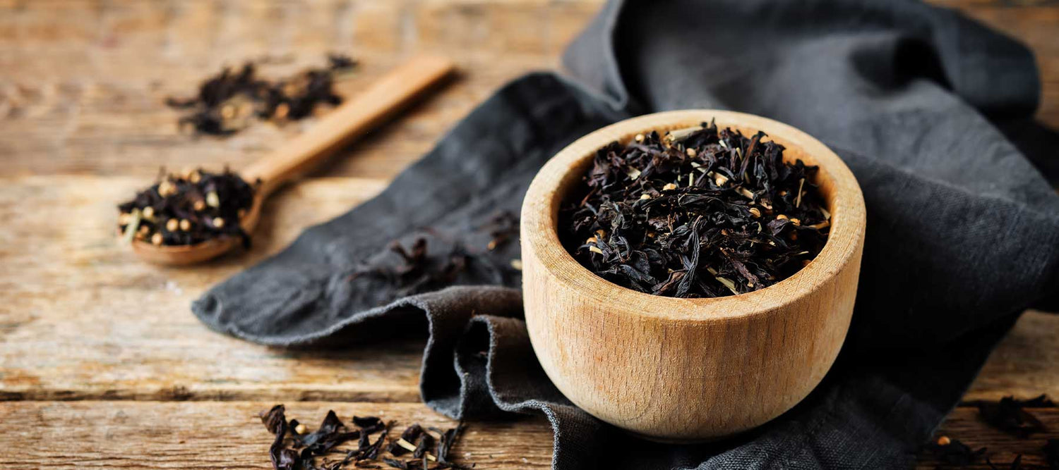 wooden bowl of caffeinated tea