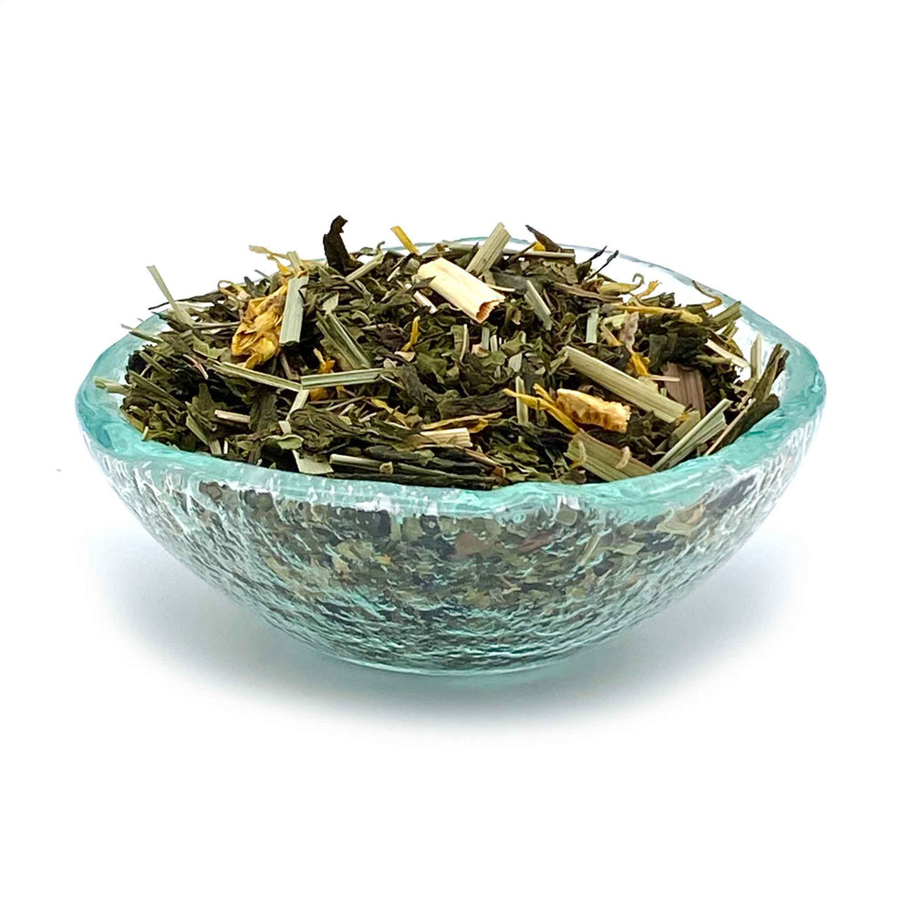 jade citrus mint tea in dish - make your own Honey Citrus Mint tea or Medicine ball tea at home!