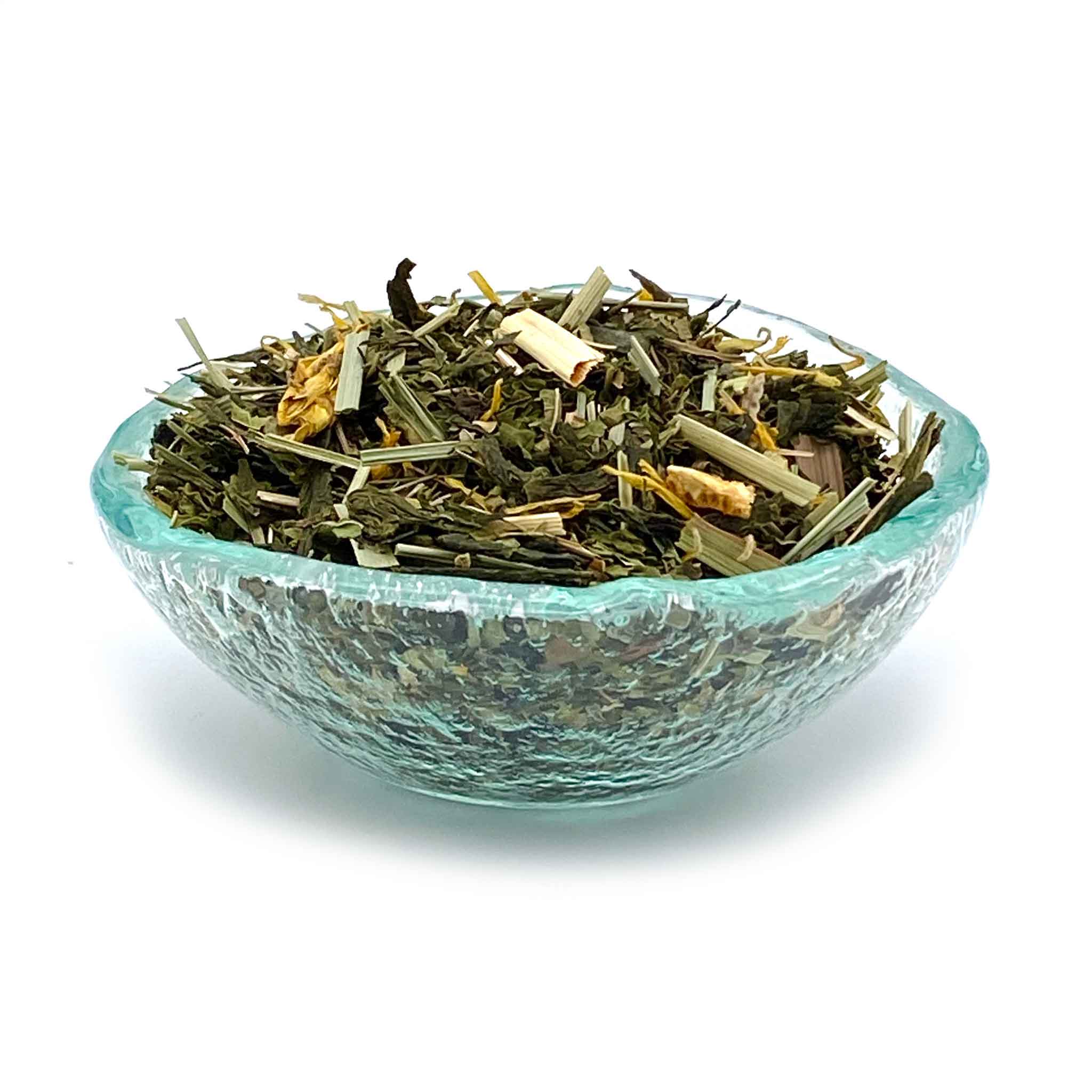 jade citrus mint tea in dish - make your own Honey Citrus Mint tea or Medicine ball tea at home!