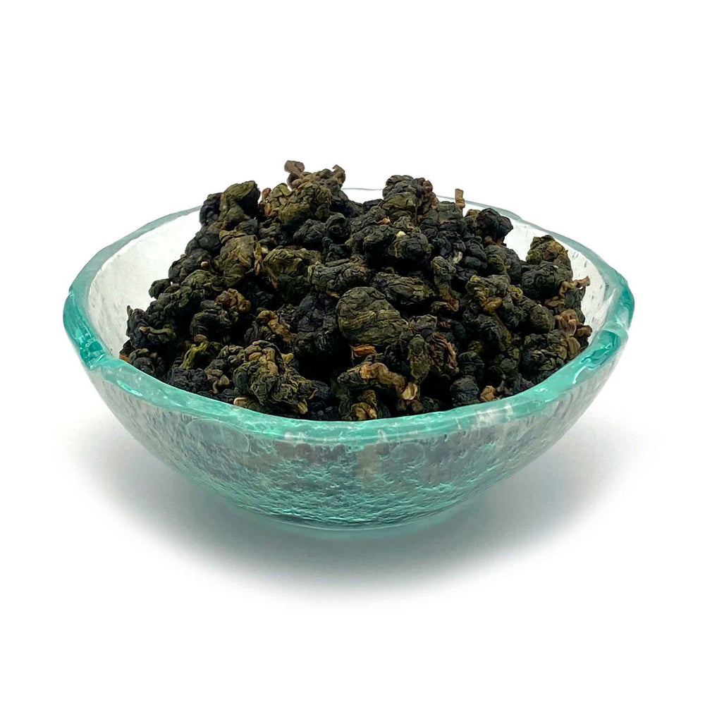 oolong milk tea in dish jin xuan tea