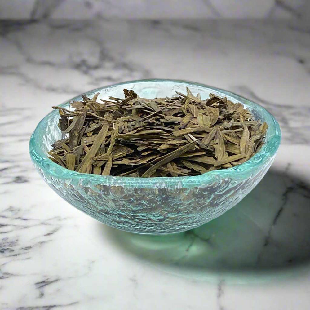dragonwell longjing tea in dish