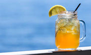 ice cold glass of cold brew green tea poolside