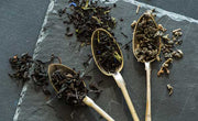 three spoonfuls of different types of black tea