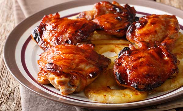 Recipe for Peach Barbecue Sauce served over chicken and pineapple