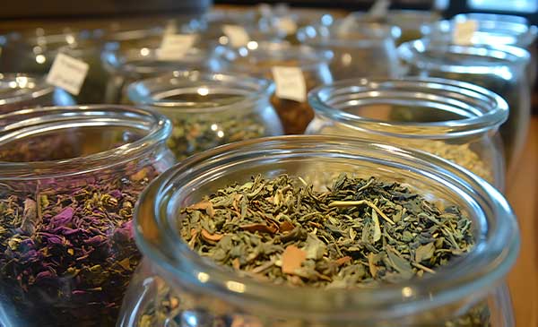 Jars of herbs and spices used in functional teas