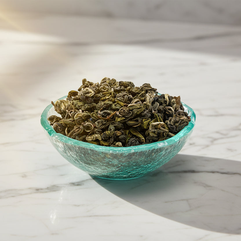 emperors clouds and mist green tea in dish