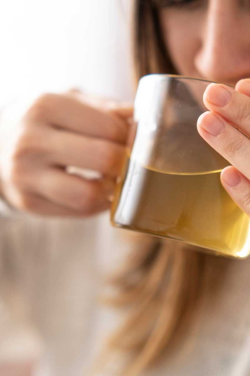 girl drinking cup of green tea for weightloss