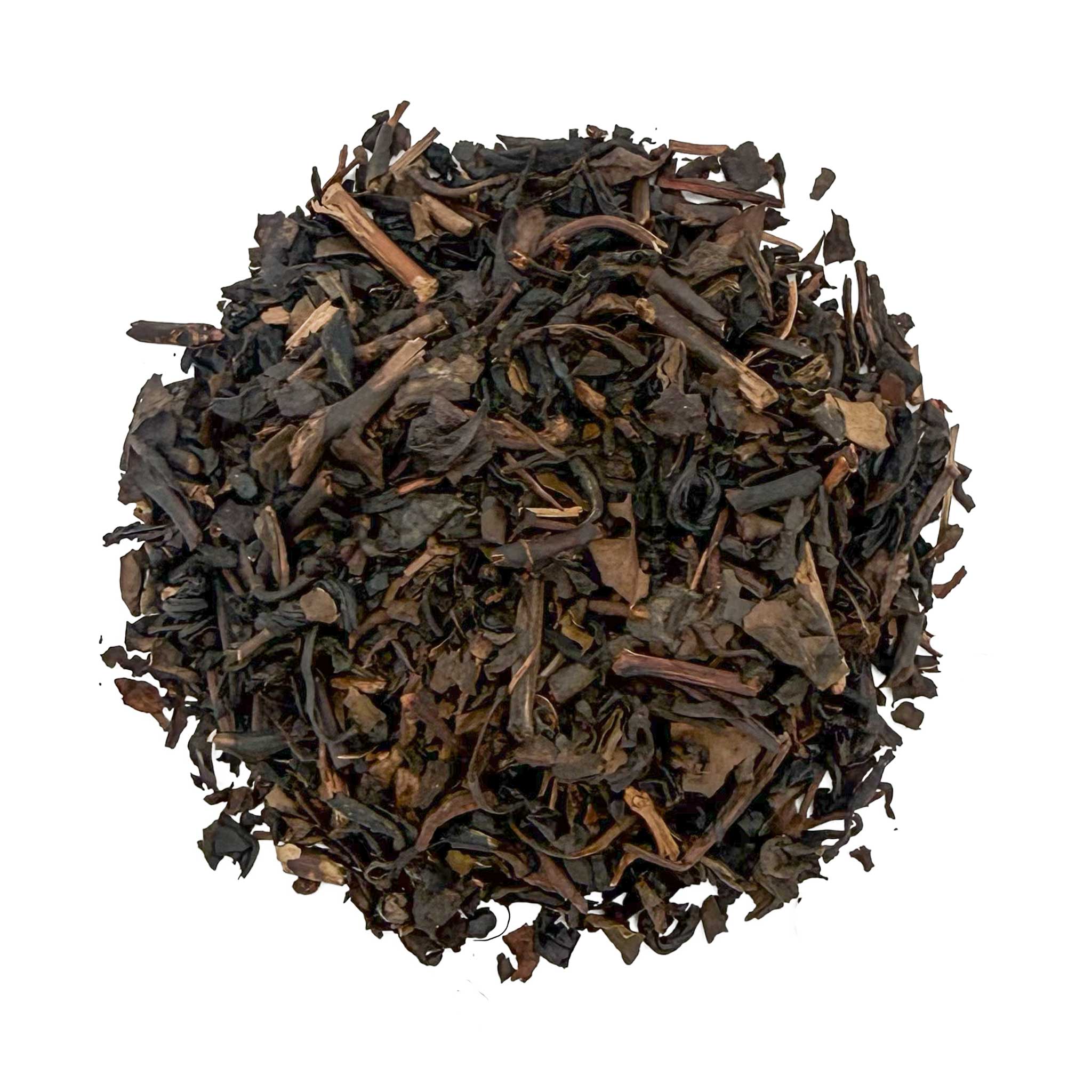 Loose leaf vanilla oolong tea leaves on a white background