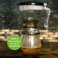 Step 4 Place tea infuser on mug to release tea from the bottom into your cup