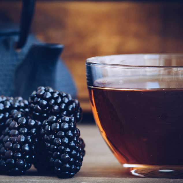 raspberry black tea with iron kettle