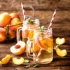 refreshing tranquil peach cold brew iced tea pouch in glass